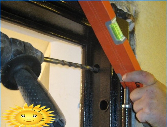 Hur man installerar en metalldörr med dina egna händer